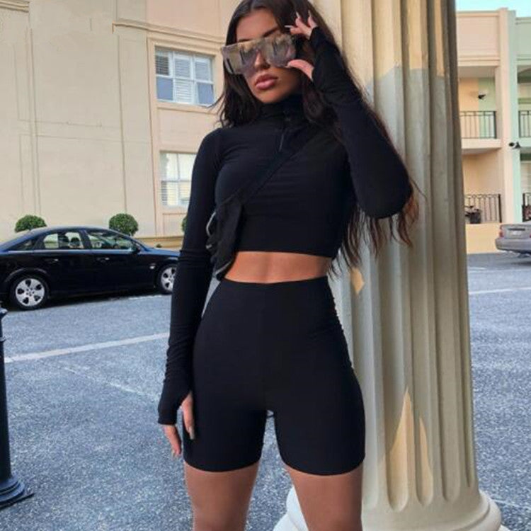 black Seamless Yoga Set with Finger Loop Sleeves and short leggings